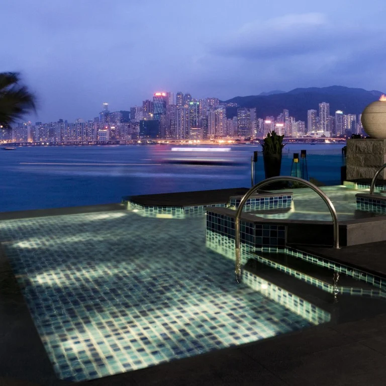 Infinity pool at Four Seasons Hotel Hong Kong with stunning Victoria Harbour views, a top luxury stay in HK