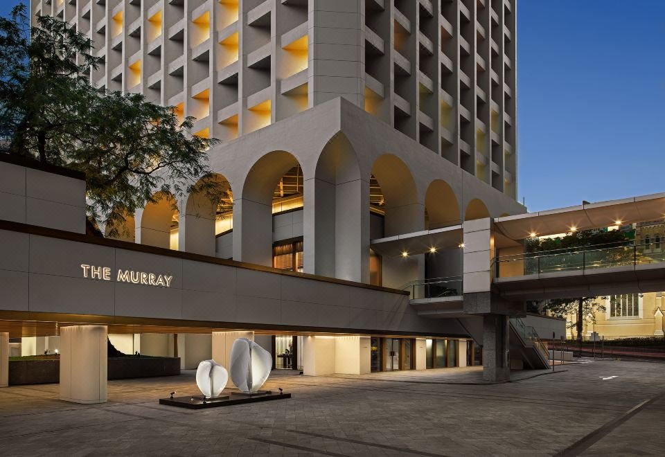 Modern exterior of The Murray Hong Kong, a Niccolo Hotel, with iconic arches, a standout among luxury hotels in Hong Kong