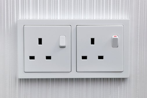 Example of a standard Hong Kong wall socket with three-pin design